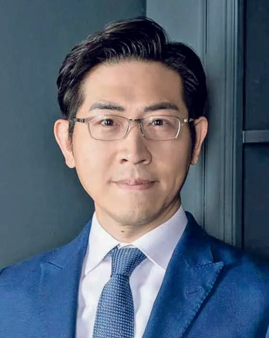 華人白宮記者張經義。