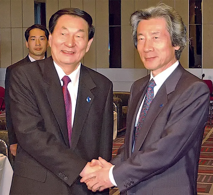 朱鎔基與新加坡前總理李光耀會面。